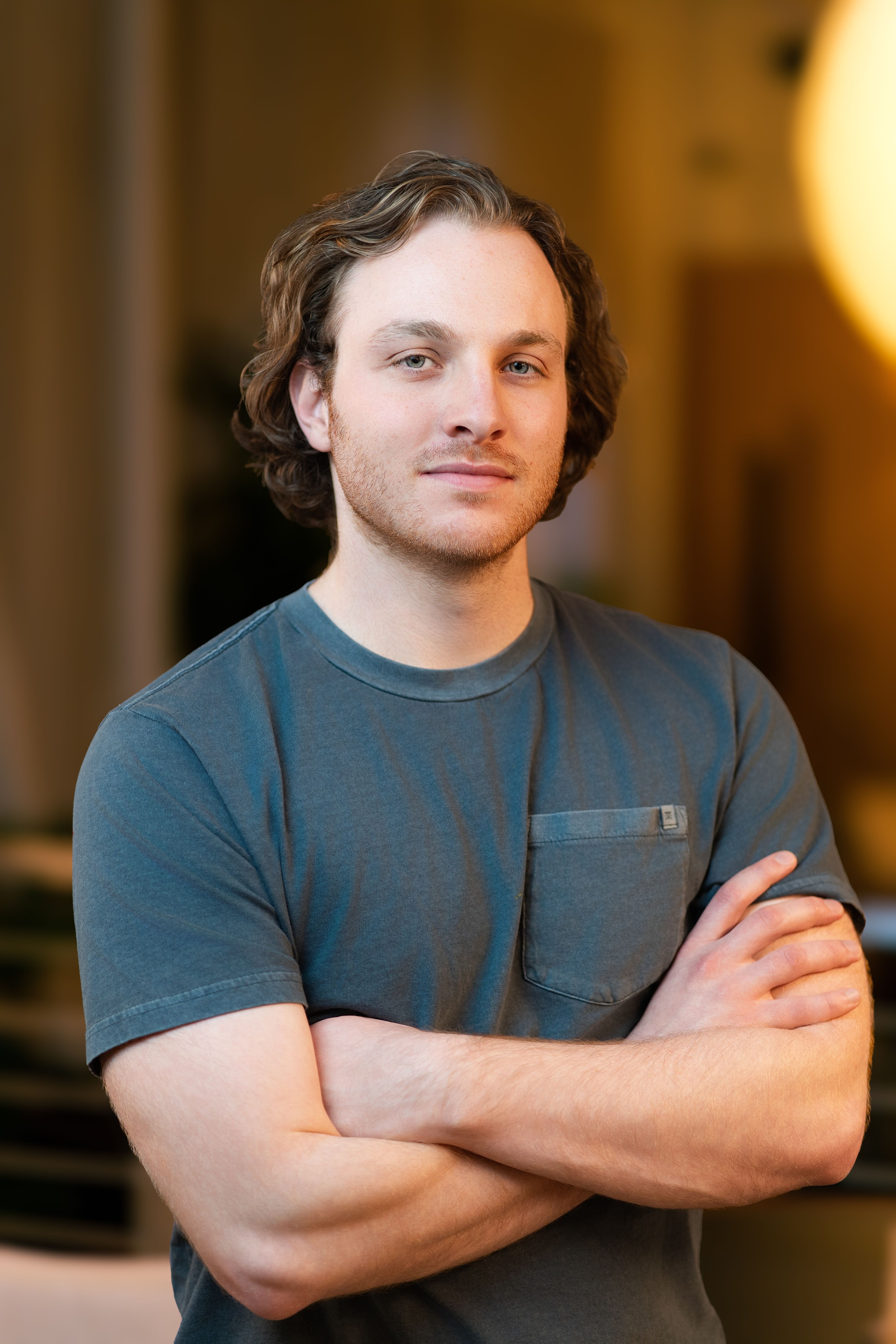 Portrait of Tim Glaser, Co-founder and co-CEO at PostHog